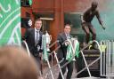 Celtic's Callum McGregor (left) with the Scottish Gas Scottish Cup and Celtic manager Brendan Rodgers with the cinch Premiership trophy during a trophy celebration at Celtic Park, Glasgow.