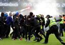 Swinney said the actions of fans was “completely and utterly unacceptable”.