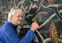 Jane Frere putting the finishing touches to her wildcat