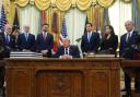 The US representatives listen to president Donald Trump in the White House