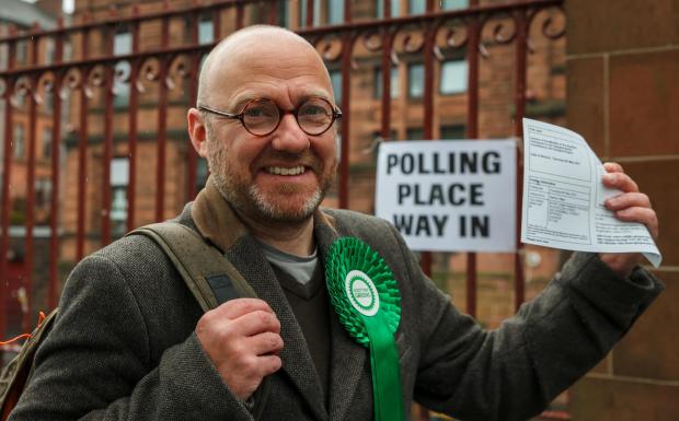 The National: Scottish Parliament election polling day..Scottish Greens co-leader Patrick Harvie arrives to vote at Notre Dame primary school, Glasgow. Patrick is the Green's candidate for Glasgow Kelvin...  Photograph by Colin Mearns.6th May 2021..