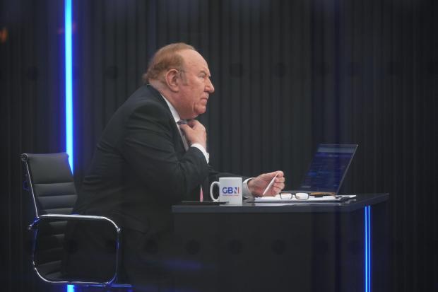 The National: Andrew Neil sits at a desk