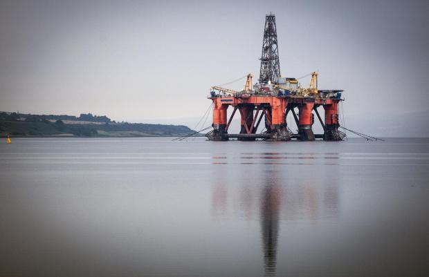 The National: Oil rig anchored in the Cromarty Firth, Invergordon Picture: JANE BARLOW/PA