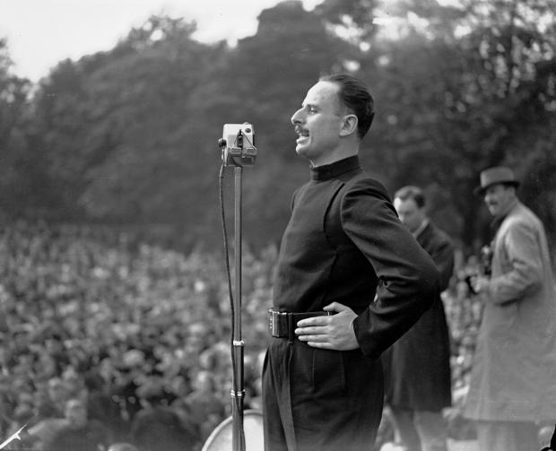 The National: Sir Oswald Mosley makes his address to the fascist 'Blackshirts', assembled in Victoria Park, London, June 7, 1936. Many fascists and communists were arrested in Victoria Park when thousands of Blackshirts assembled to hear an address by their
