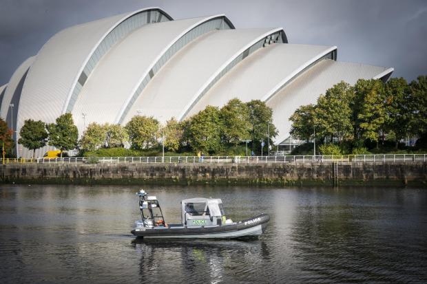 The National: Police patrol boat on the River Clyde near the COP26 venues as Police Scotland counter terrorism announce a Project Servator campaign ahead of the international climate conference, being held in Glasgow. Project Servator aims to to deter, detect and