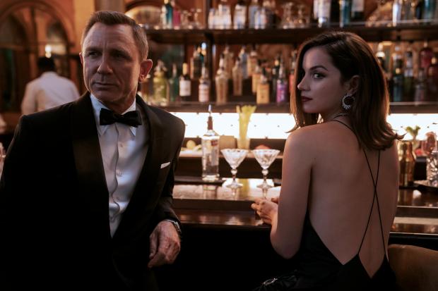 The National: B25_39456_RC2
James Bond (Daniel Craig) and Paloma (Ana de Armas) in
NO TIME TO DIE 
an EON Productions and Metro Goldwyn Mayer Studios film
Credit: Nicola Dove
© 2020 DANJAQ, LLC AND MGM.  ALL RIGHTS RESERVED.