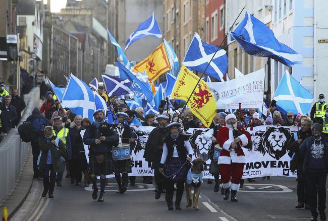 A march from Edinburgh Castle to Holyrood by Scotland's Independence Movement marking St Andrew's Day saturday..Photograph: Gordon Terris, 27/11/21