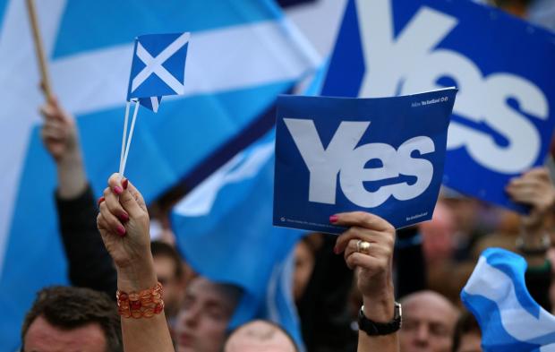 The National: File photo dated 16/09/14 of supporters at a Yes Rally in George Square ahead of voting in the Scottish independence referendum. A majority of people in Scotland would vote for independence if there was a no-deal Brexit, polling has suggested. PRESS