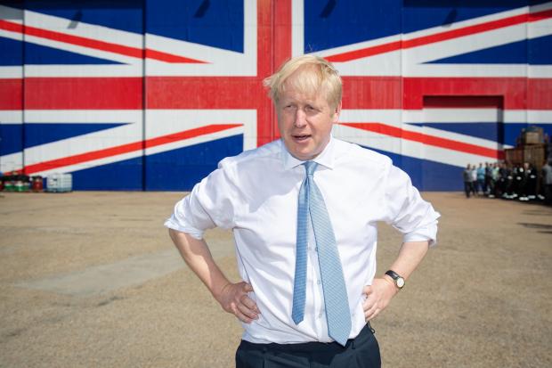The National: Conservative party leadership contender Boris Johnson poses for a photo at the Wight Shipyard Company at Venture Quay during a visit to the Isle of Wight. PRESS ASSOCIATION Photo. Picture date: Thursday June 27, 2019. See PA story POLITICS Tories. Photo