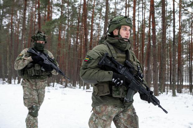 The National: PABRADE, LITHUANIA - JANUARY 27: Lithuanian Soldiers from the King Mindaugas Hussar Battalion during shooting training in Silvestras Zukauskas landfill on January 27, 2022 in Pabrade, Lithuania. Tensions between the NATO military alliance and Russia are