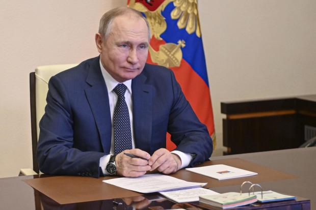 The National: Russian President Vladimir Putin takes part in the launch of a new ferry via a conference call at the Novo-Ogaryovo residence outside Moscow Moscow, Russia, Friday, March 4, 2022. (Andrei Gorshkov, Sputnik, Kremlin Pool Photo via AP).