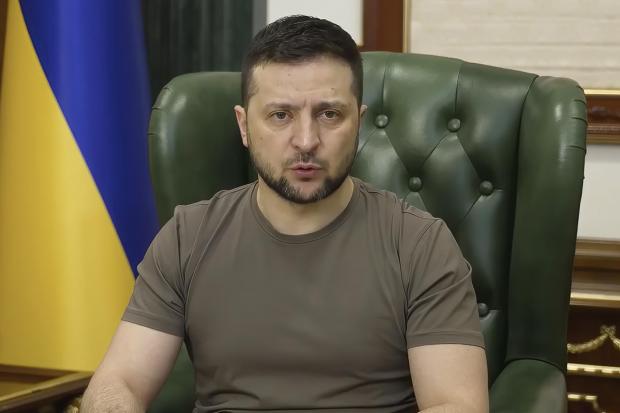 The National: In this image from video provided by the Ukrainian Presidential Press Office, Ukrainian President Volodymyr Zelenskyy speaks from Kyiv, Ukraine, early Monday, March 21, 2022. (Ukrainian Presidential Press Office via AP)