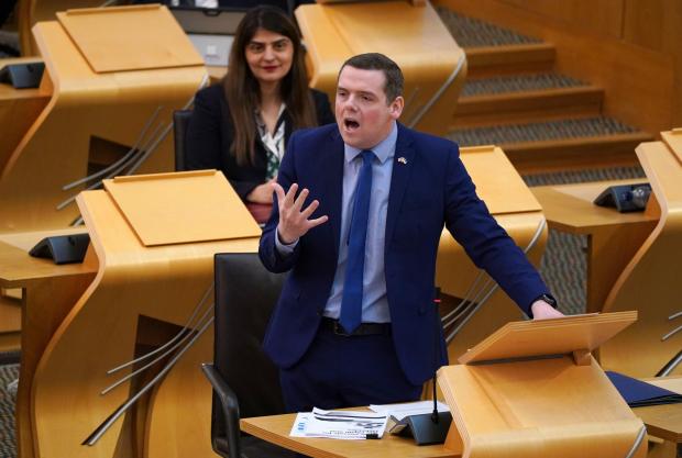 The National: Scottish Conservative leader Douglas Ross during First Minster's Questions at the Scottish Parliament in Holyrood, Edinburgh. Picture date: Thursday March 24, 2022. PA Photo. Photo credit should read: Andrew Milligan/PA Wire.