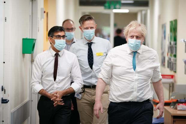 The National: Sunak, left, and Johnson, right, during a hospital visit in Kent