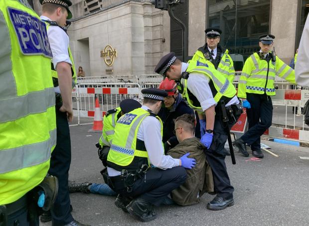 The National: Met police arresting XR protestors in London earlier this month