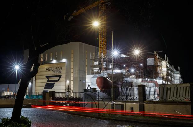 The National: Night time view of a vessel under construction at the Ferguson Marine shipyard at Port Glasgow