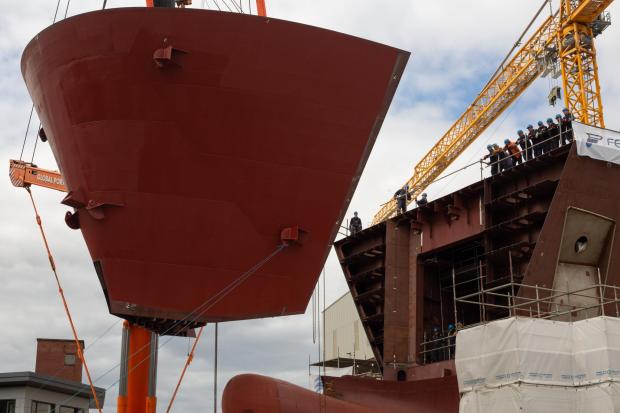 The National: The 100-tonne block lift of the bow to be connected onto Hull 802
