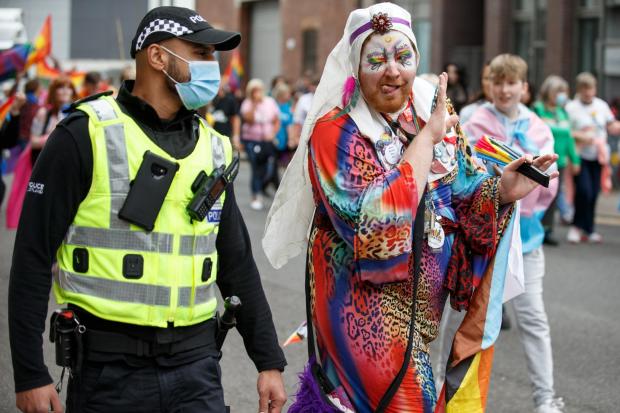 The National: A Police Scotland officer alongside a Glasgow Pride participant in 2021 