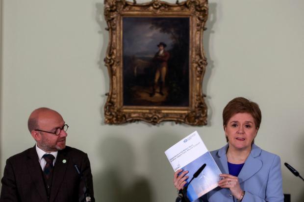 The National: Patrick Harvie and Nicola Sturgeon launching a new paper on Scottish independence 