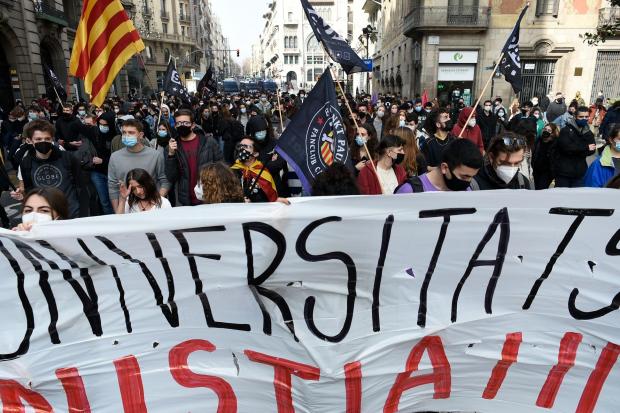 The National: Students protest against the imprisonment of Spanish rapper Pablo Hasel in Barcelona on February 19, 2021