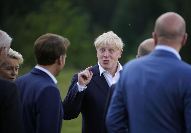 The National: Boris Johnson speaks with world leaders in Germany 