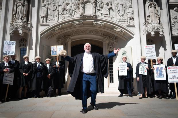 The National: Barristers in England have been striking over legal aid