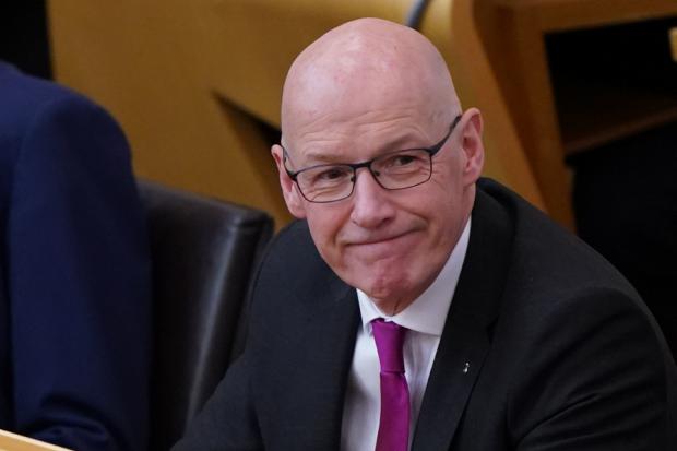 SNP leader John Swinney has been elected first minister by MSPs at Holyrood