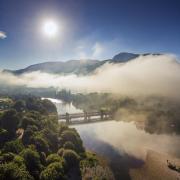 The River Lochy with Ben Nevis above the mist.