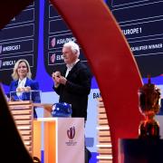 Yann Arthus Bertrand picks out a ball  during the Rugby World Cup France 2023 draw on Monday
