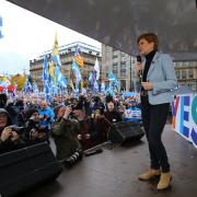 Nicola Sturgeon (main) speaking at a rally for independence