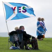People take part in the All Under One Banner Scottish independence demonstration at the Robert the Bruce statue at the Battle of Bannockburn site near Stirling. PA Photo.