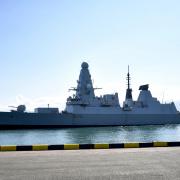 Moscow claims it fired warning shots at British destroyer HMS Defender