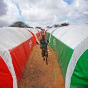 A displaced Somali man in a refugee camp. Charity leaders Bond say the UK overseas aid budget cut will cost lives