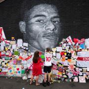 The Marcus Rashford mural in Withington, Manchester, has been covered in kind messages