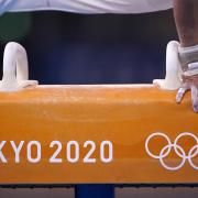 A competitor on the Pommel Horse during the men's artistic gymnastics at Tokyo 2020