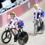 Laura Kenny (left) and Katie Archibald celebrate winning gold in the Women's Madison Final