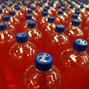 Makers of major drinks brands, including Irn-Bru have called on the next first minister to continue with deposit return scheme plans