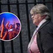 Therese Coffey has been branded 'callous' after she was filmed singing at a Tory conference event while her department's cuts to Universal Credit came into effect