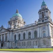 The row surrounds plans to light up Belfast City Hall