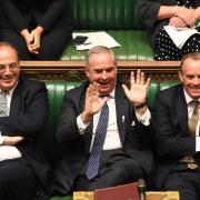Former attorney general Geoffrey Cox, centre, made almost £1m from a second job working in a tax haven