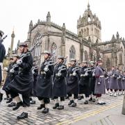 Members of the Royal Navy parade down the Royal Mile during today's Remembrance Sunday service