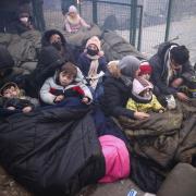 Migrants gather at the Belarus-Poland border. Photograph: AP