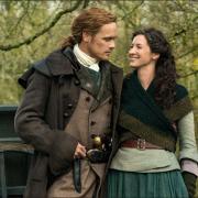 Sam Heughan and Caitríona Balfe appearing in the hit show Outlander