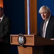 Boris Johnson announces tightening of coronavirus rules in England after Omicron reaches UK