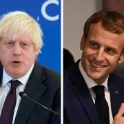 Boris Johnson has been accused of 'double-speak' by the French government led by Emmanuel Macron (right)