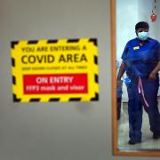 A nurse walks through a Covid ward. Photo: PA