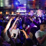 Revellers at a nightclub in Birmingham saw in the New Year without the stricter Covid rules in place in Scotland and Wales
