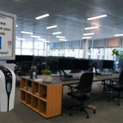 A hand sanitiser station in an empty office. Photo: PA