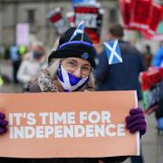 Demonstrators from pro-independence organisation All Under One Banner assemble in George Square, Glasgow, to take part in an 'emergency demonstration' against the Prime Minister, calling for the 'end of Tory rule' and 'independence now'