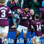 Ellis Simms celebrates with team-mate Cammy Devlin after scoring Hearts' second goal versus Motherwell at Tynecastle